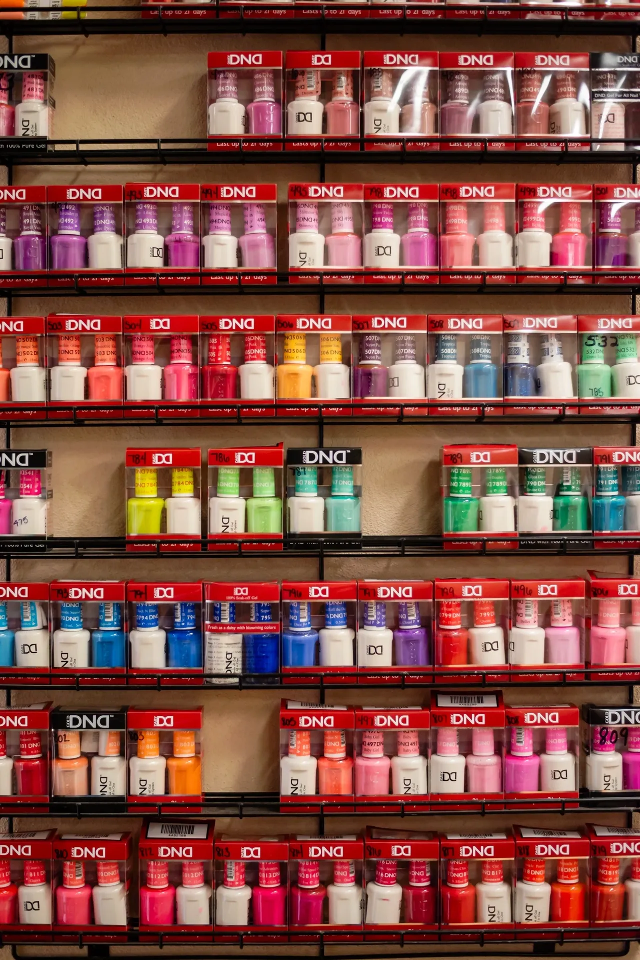 Assorted nail polish on racks